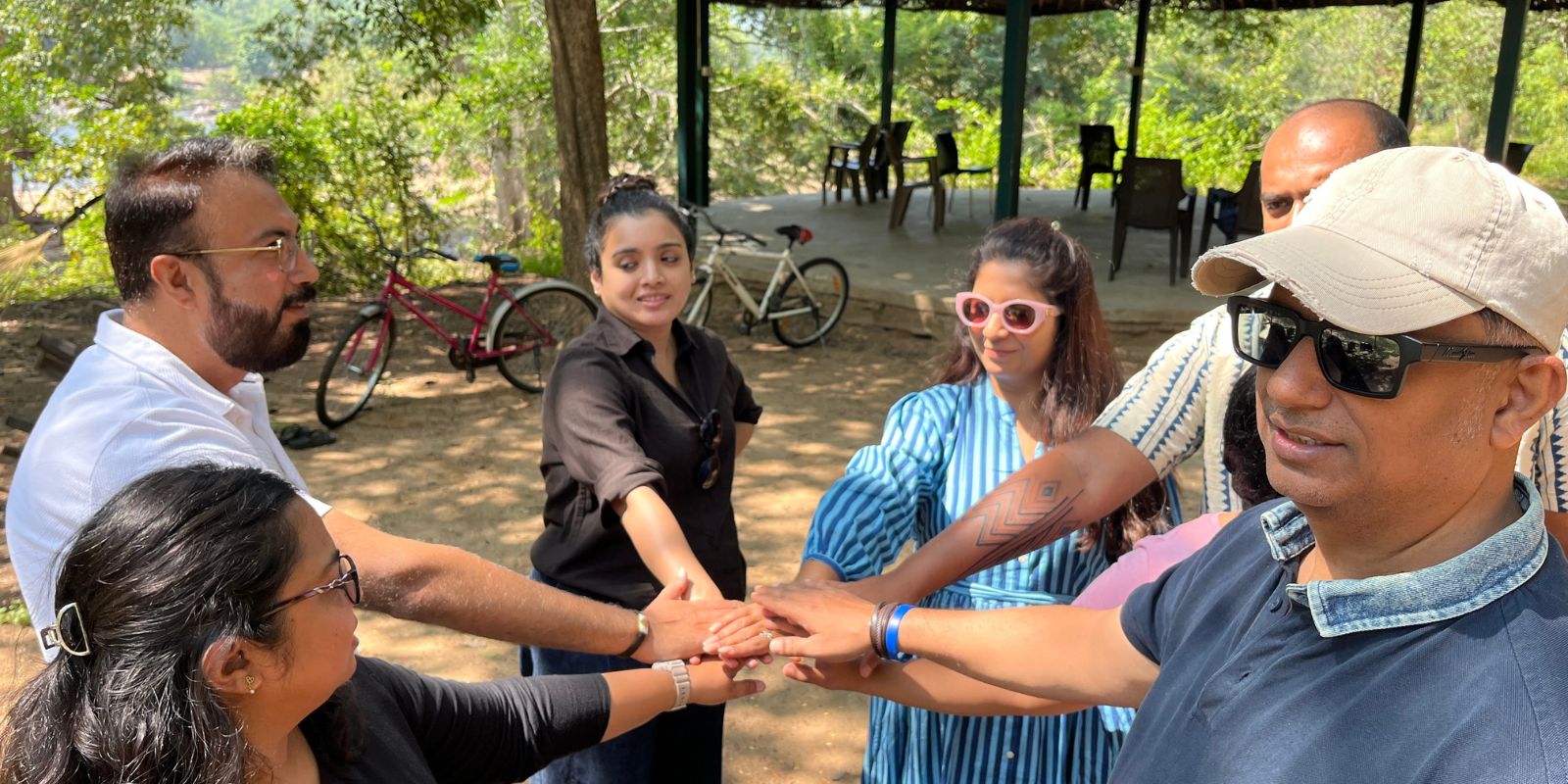 Happy group of diverse people on a nature walk during a weekend retreat